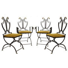 A Set of 4 Iron Directoire Style Chairs with Swan's Head Details