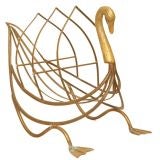 A Magazine/Newspaper Rack in the Form of a  Patinated Brass Swan