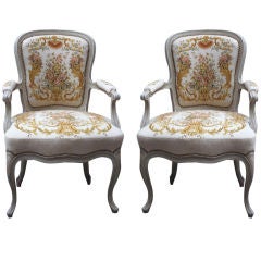 A Pair of Grey and Cream Painted French Louis XV Style Fauteuils