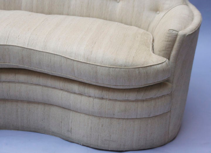 An American mid century kidney shaped loveseat. at 1stdibs