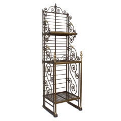 A 1920's French 7 Tiered Steel and Bronze Baker's Rack