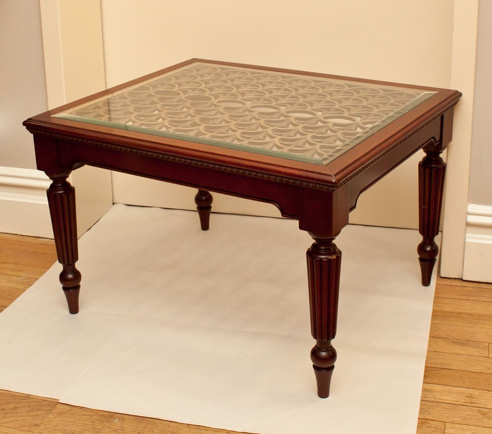 A Mahogany Side Table with Inset Bronze Grill Below Glass Top
