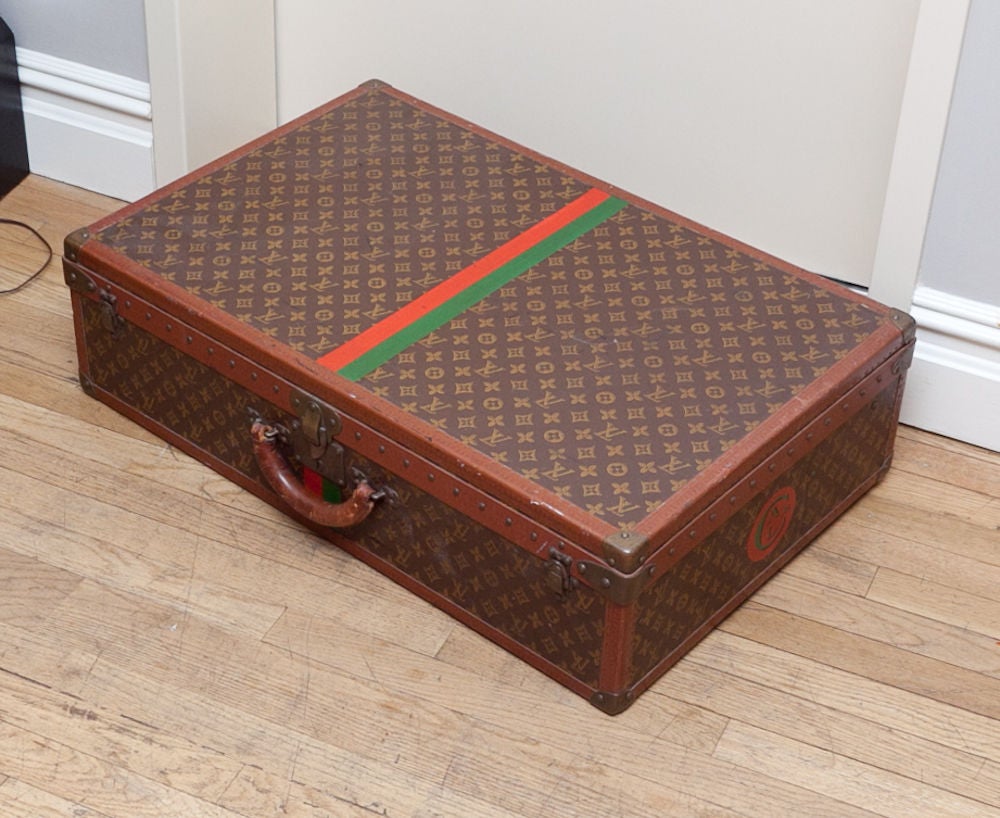 A Set of 3 1920's Monogrammed Louis Vuitton Suitcases 1