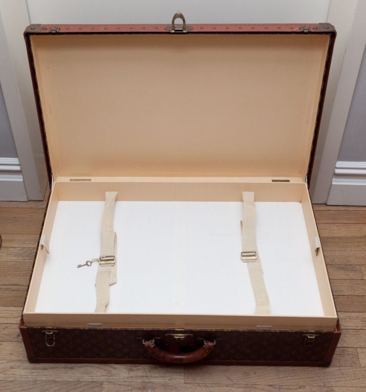 A Set of 3 1920's Monogrammed Louis Vuitton Suitcases 3