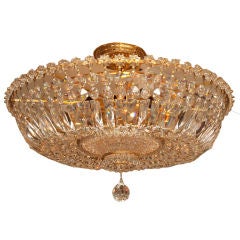 A Round Flush Mounted Ceiling Fixture with Gilt Bronze Frame