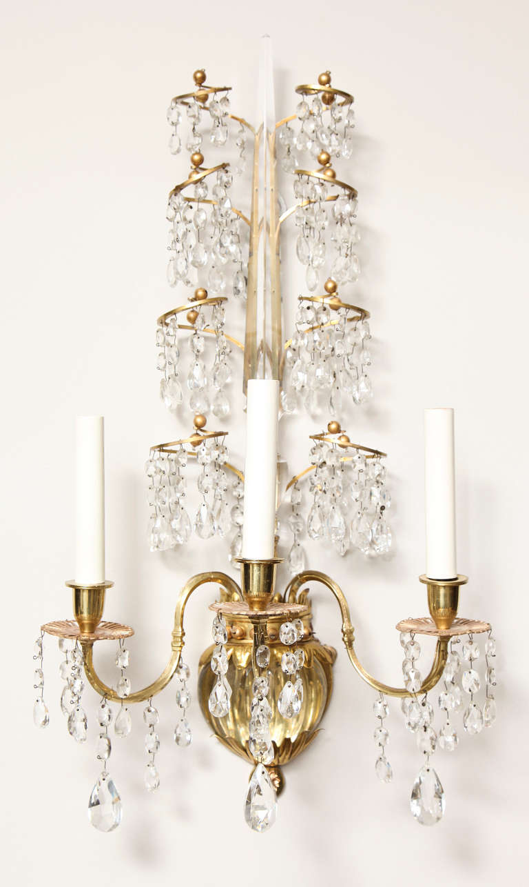 A Pair of Three Light Bronze Baltic-Style Wall Sconces In Excellent Condition In New York, NY
