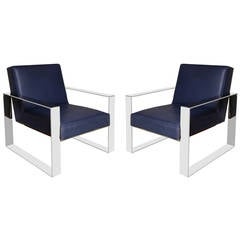 Pair of Large Scale Chrome and Leather Armchairs
