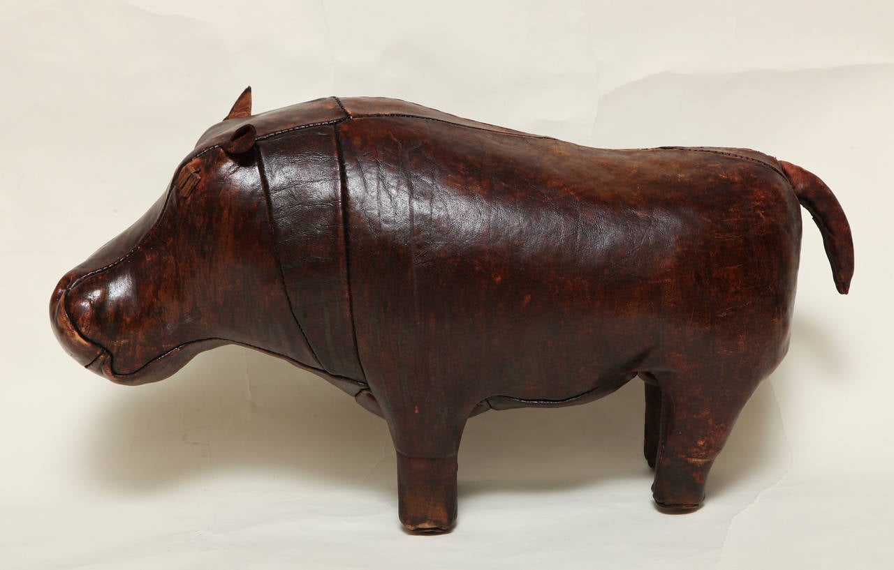 An Abercrombie and Fitch leather hippopotamus with naturalistic body and details such as, pigtail ear flaps.
