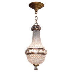 A Gilt Bronze Flush Mounted Ceiling Fixture with Draped Beads