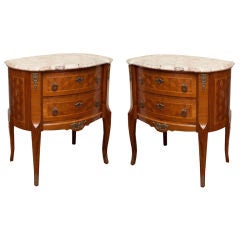 A Pair of oval transitional Louis XV Louis XVI style 2 drawer