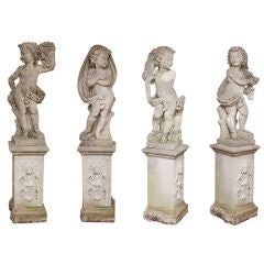 A Set of Limestone Garden Figures Depicting the Four Seasons