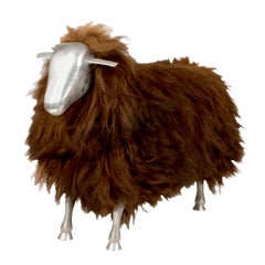 A Cast Steel Sheep with Stylized Head and Hooved Feet