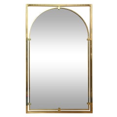A Vertical Brass Mirror By John Stuart