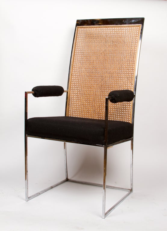 A set of eight dining chairs comprised of 6 side chairs and 2 arm chairs designed by Milo Baughman of Thayer Coggin the high back with inset panels of caning, the square frames joined by stretcher chairs bearing original makers labels on underside