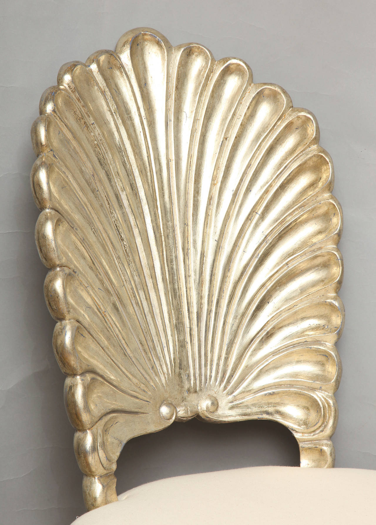 An Italian Shell Back Carved and Silver Leafed Chair 1