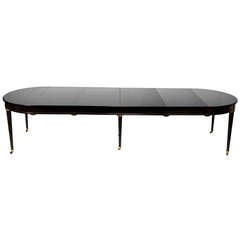 A French Louis XVI-style Ebonized Dining Table