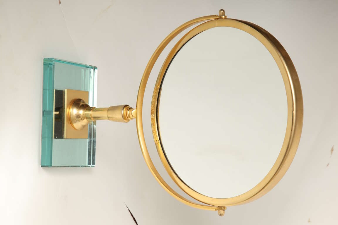20th Century A Round Gilt Metal Magnifying Mirror