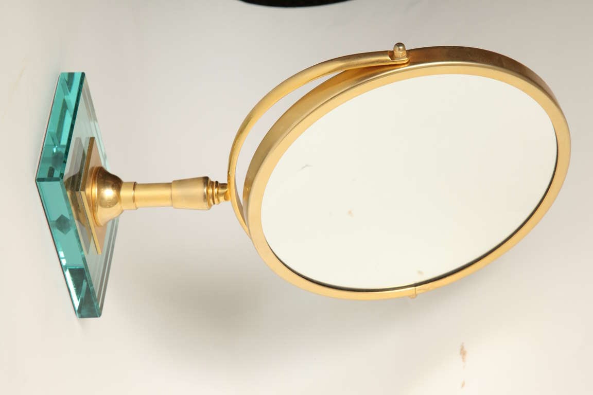 A Round Gilt Metal Magnifying Mirror 4