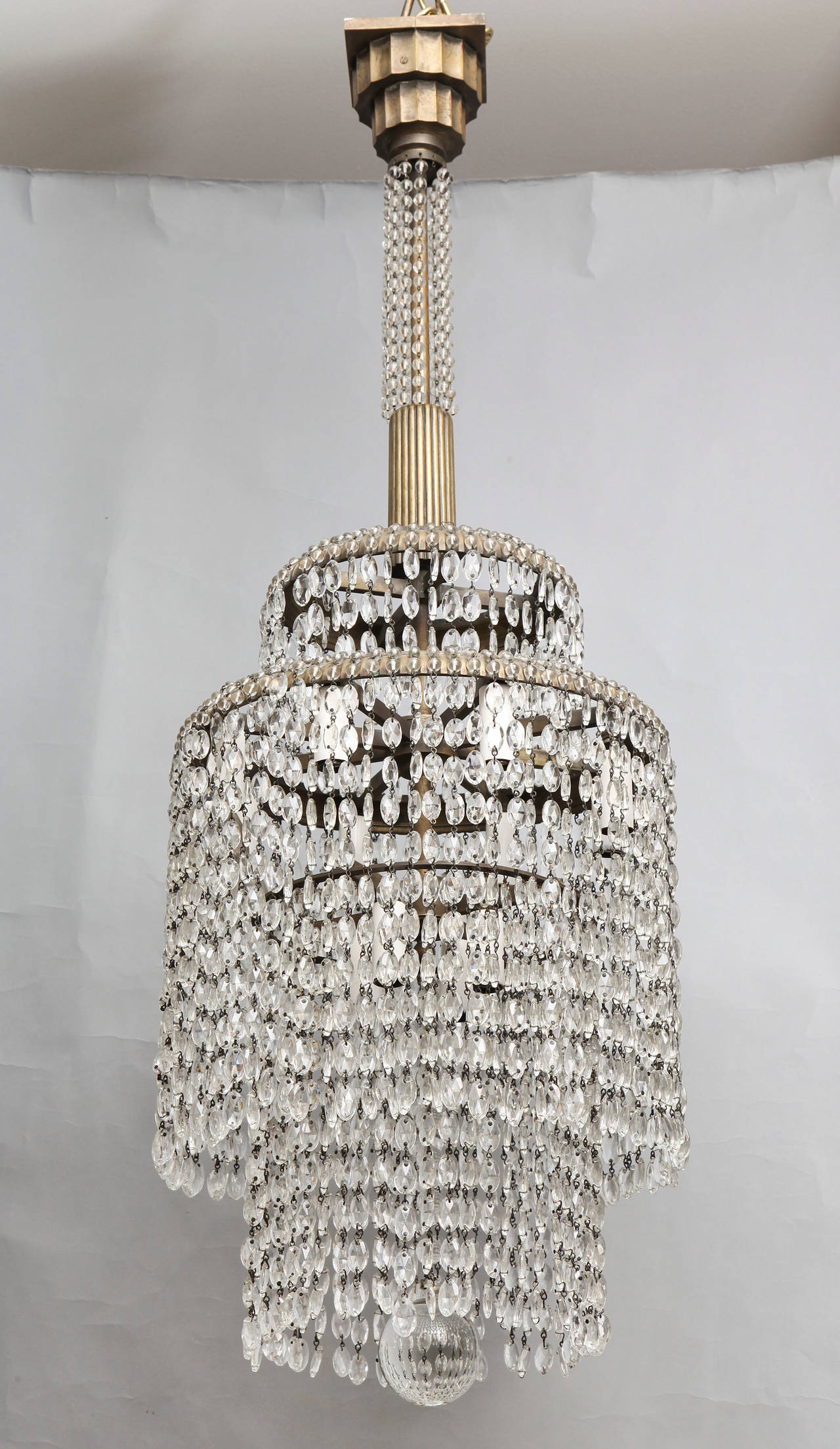A French Art Deco Crystal Chandelier in the Manner of Emile-Jacques Ruhlmann In Excellent Condition In New York, NY