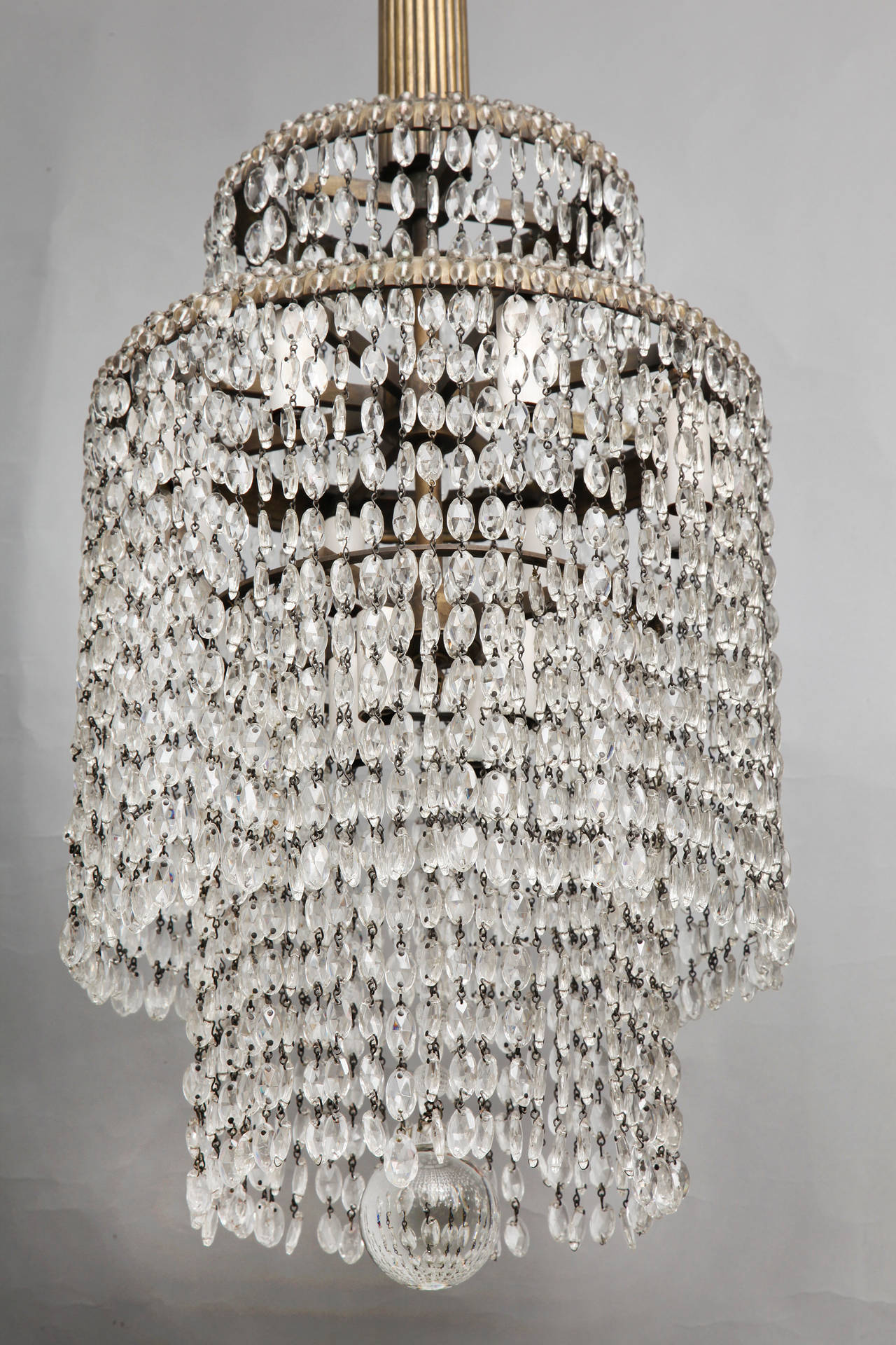Mid-20th Century A French Art Deco Crystal Chandelier in the Manner of Emile-Jacques Ruhlmann