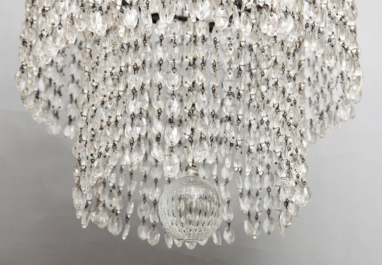A French Art Deco Crystal Chandelier in the Manner of Emile-Jacques Ruhlmann 1