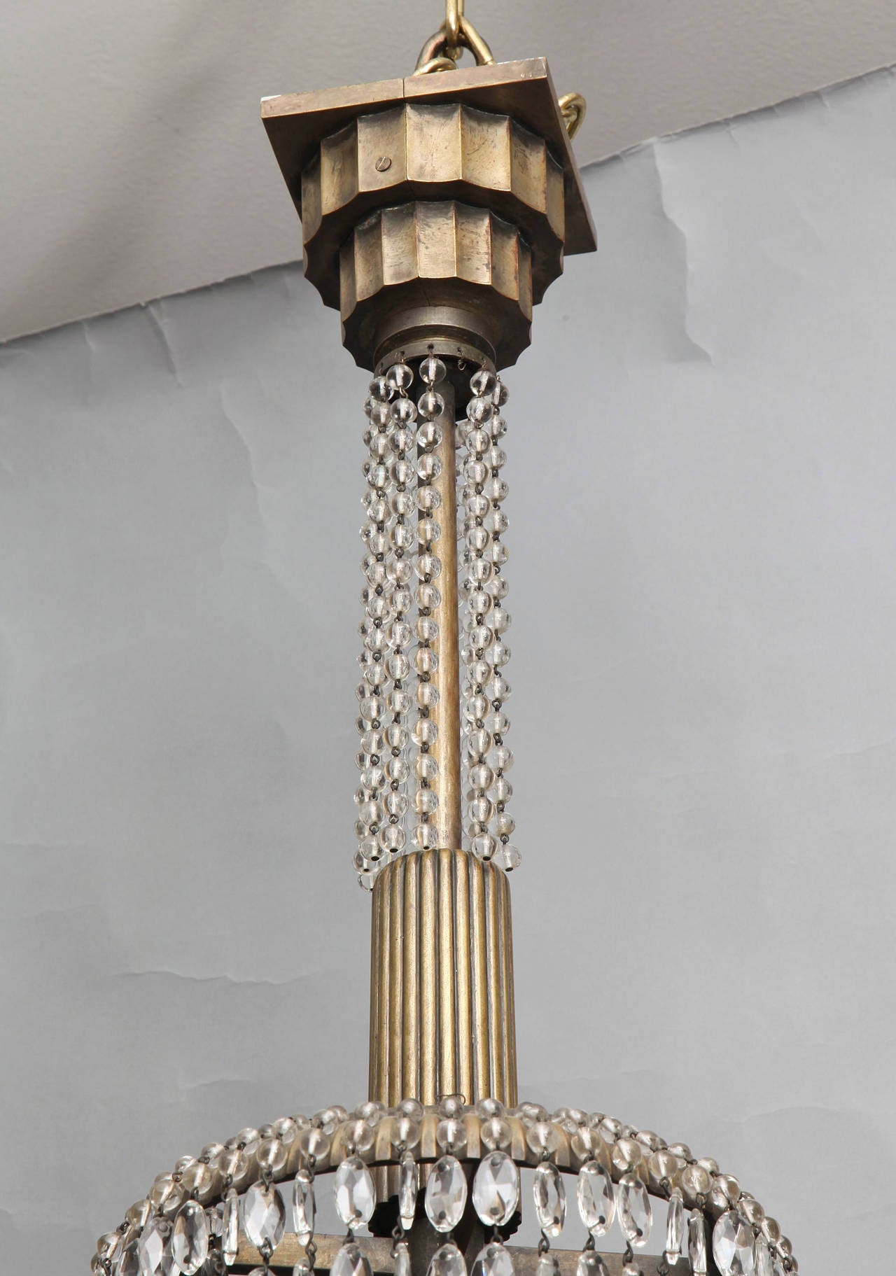 A French Art Deco Crystal Chandelier in the Manner of Emile-Jacques Ruhlmann 4