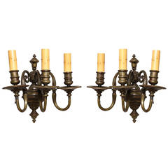 A Pair of Caldwell Dutch Style 3 Light Sconces