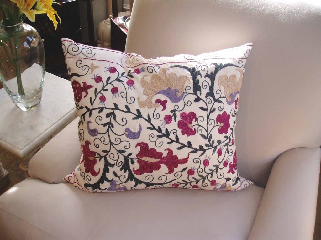 Throw pillow from Uzbekistan with Classic Suzani embroidered fabric.