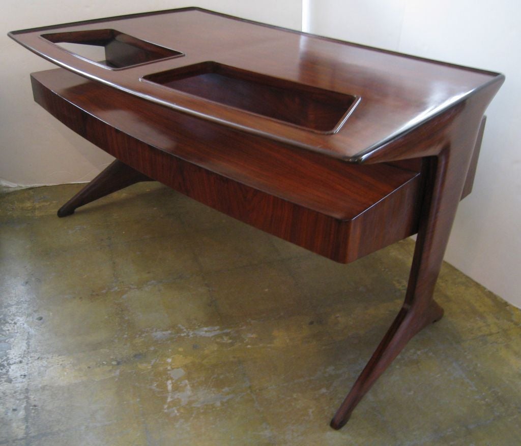 Gugliemo Ulrich Pallisander and Glass Desk. Shown without the glass top in the inital photos to prevent glare.
Literature, II Mobile Italiano Pegli
Anni '40 e '50, De Guttry Ana
Maino, pg 206 illustrates related example