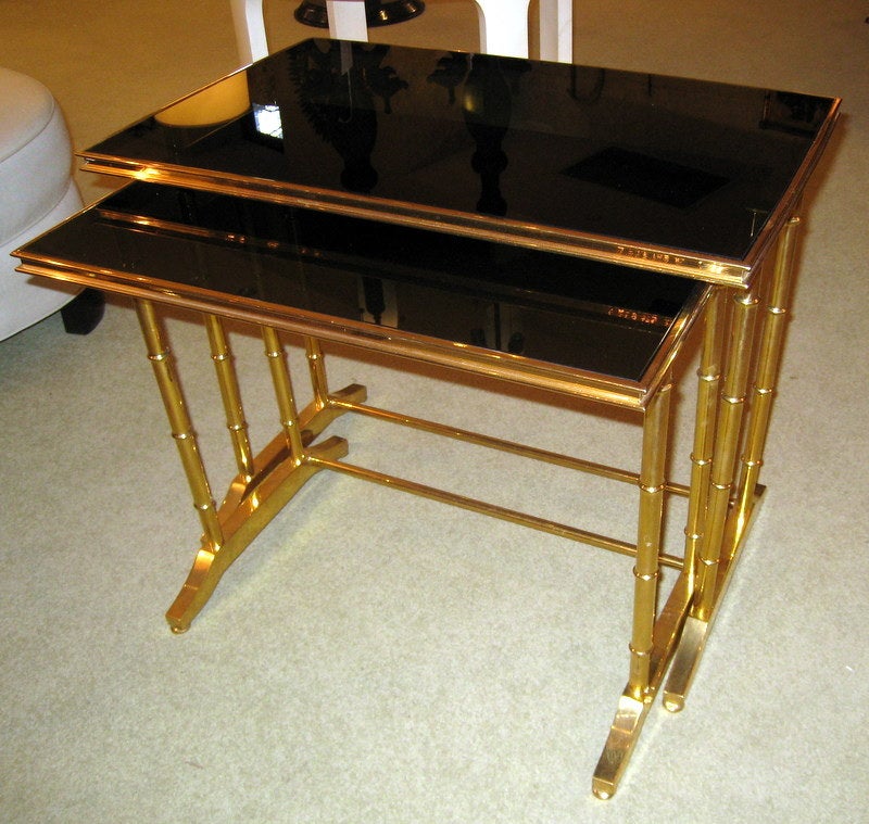Pair of Brass Nesting Tables with Black Glass
