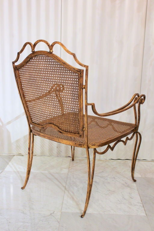 Mexican Pair of Arturo Pani gilt over iron and caned chairs For Sale