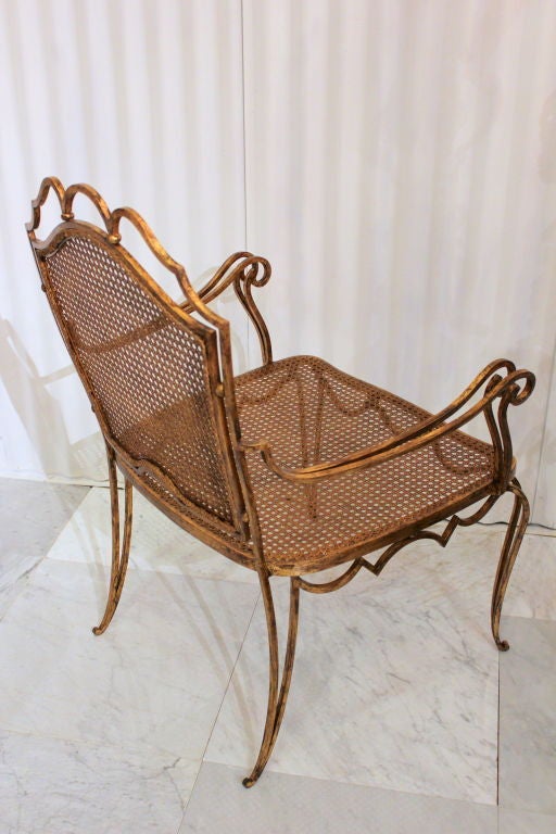 Pair of Arturo Pani gilt over iron and caned chairs In Excellent Condition For Sale In New York, NY