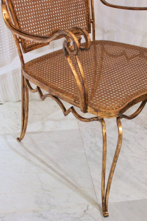 Pair of Arturo Pani gilt over iron and caned chairs For Sale 1