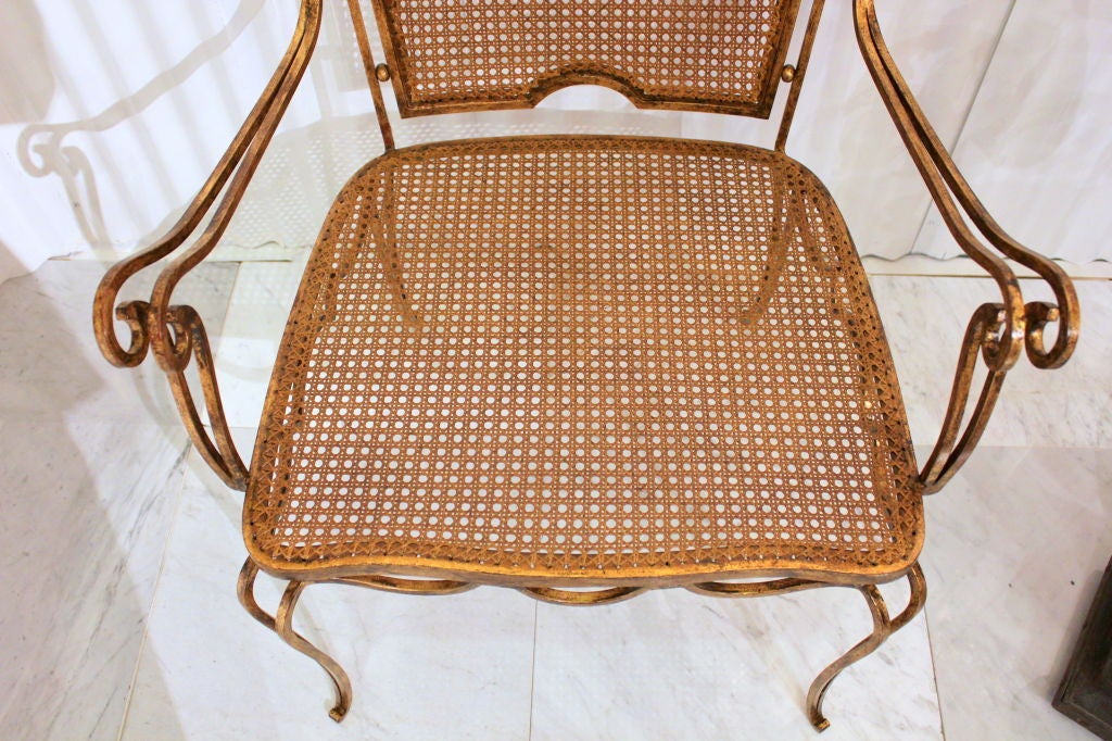 Pair of Arturo Pani gilt over iron and caned chairs For Sale 2