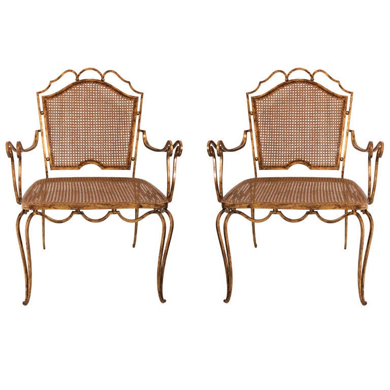 Pair of Arturo Pani gilt over iron and caned chairs For Sale