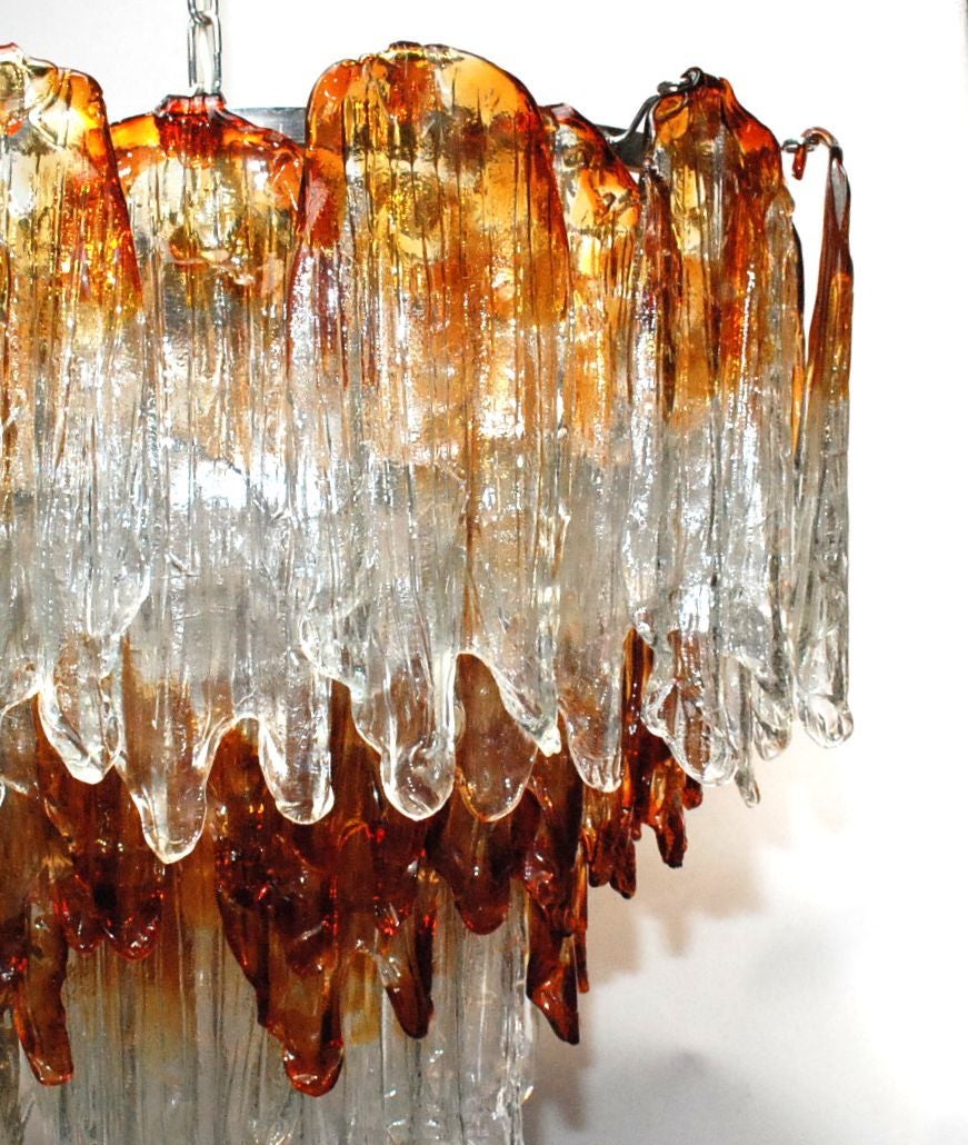 A Fiamme Murano glass chandelier by Mazzega. Chrome hardware. Size given if for fixture only (chain and canopy extra). Chandelier has ten light sockets.