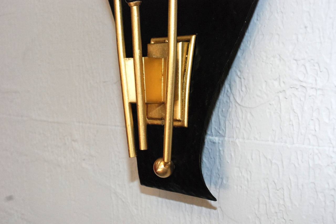 Italian Pair of Black and Brass Shield Sconces in the style of  Stilnovo