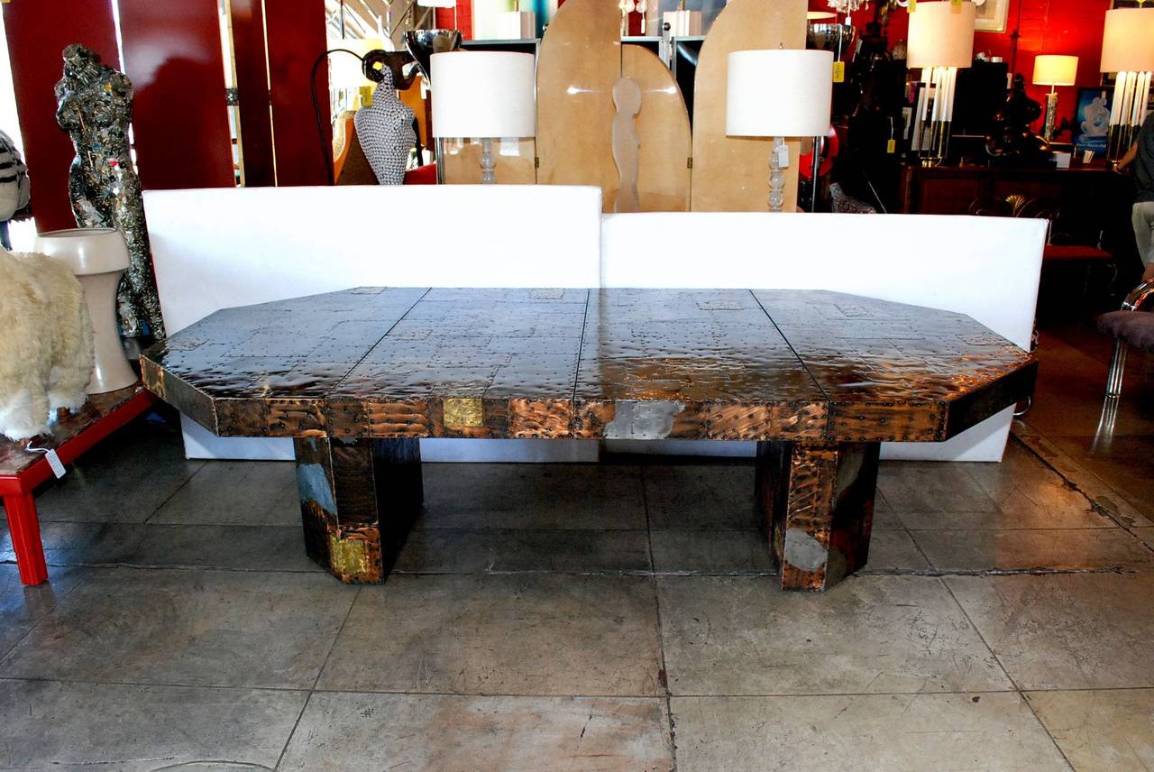 An amazing vintage Paul Evans custom patchwork dining table. It has two large 24