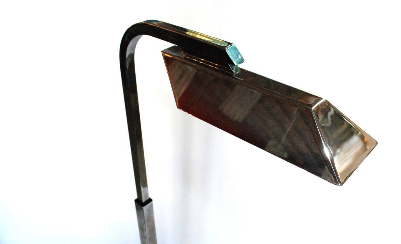 A vintage Charles Hollis Jones adjustable Pharmacy floor lamp in nickel. Signed and dated 1973. As pictured, it is 46