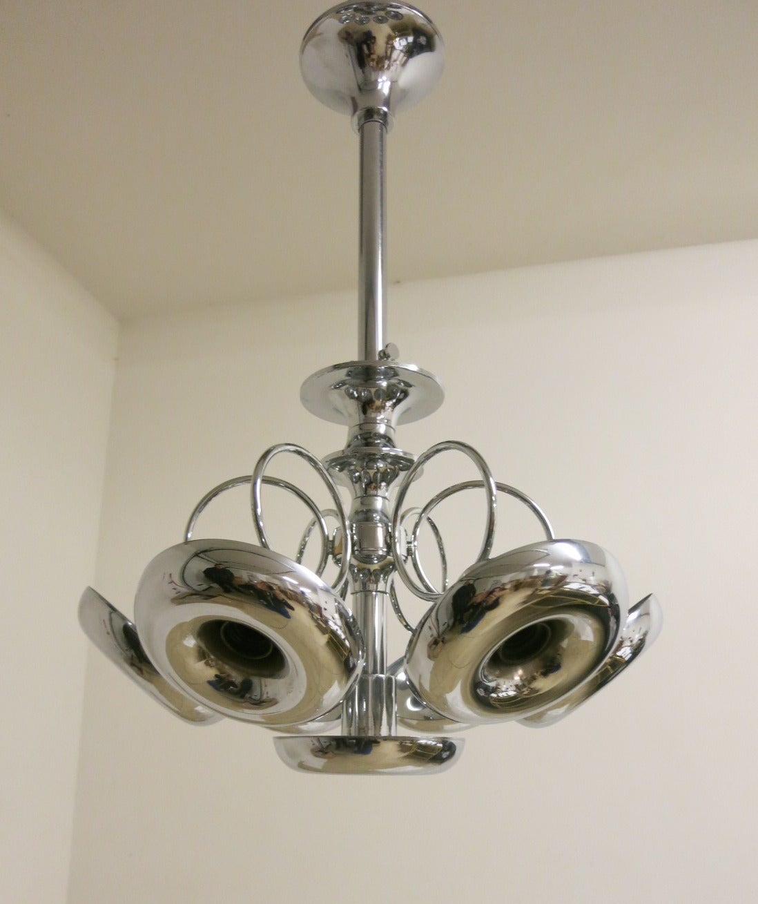 Seven-light chrome trumpets chandelier by Sciolari. Please note dimension of chandelier overall height is 30