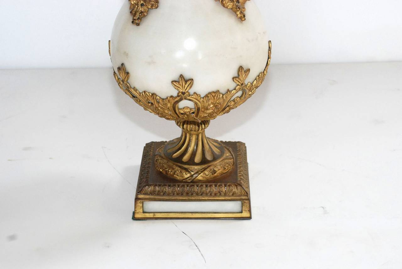 Pair of Louis XVI Style Bronze-Mounted Carrara Marble Urn-Form Garnitures In Good Condition In Cathedral City, CA