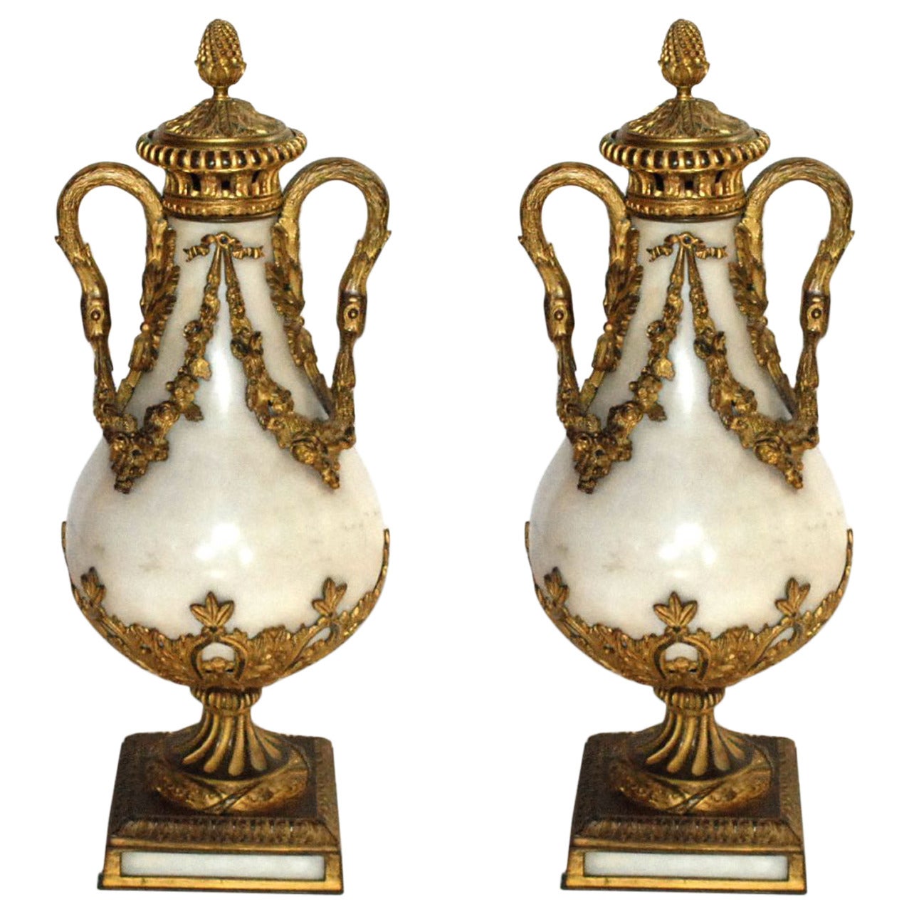 Pair of Louis XVI Style Bronze-Mounted Carrara Marble Urn-Form Garnitures