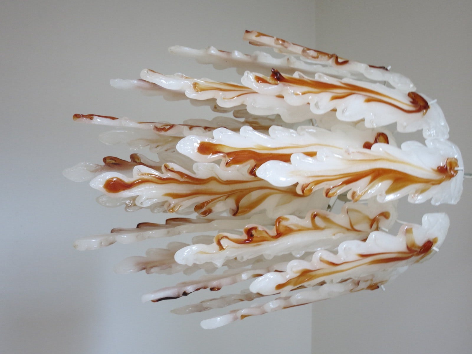 Elegant 1960's  milky and amber stalactites 4 lights Mazzega chandelier. Please note  chandelier has 23 pcs of glass dimension of each glass is 17”h