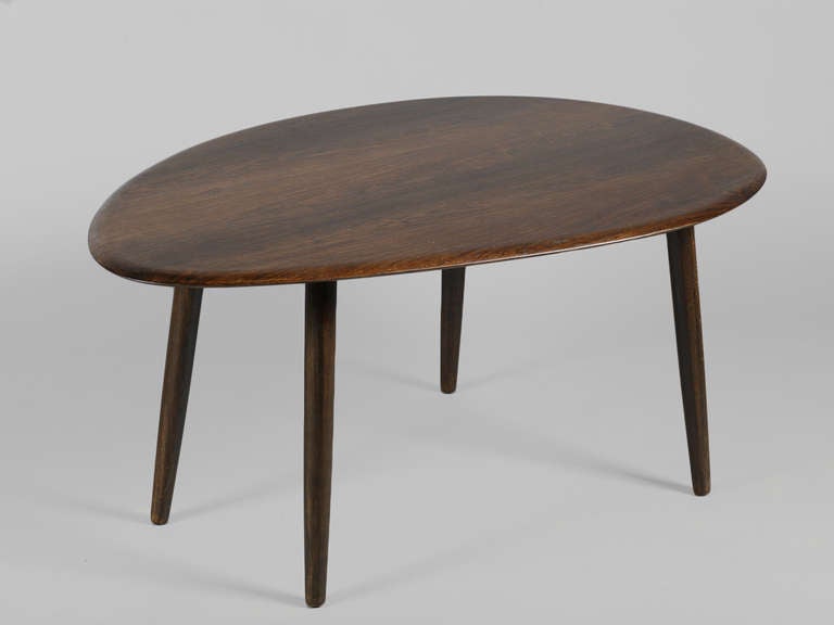 Vintage 1960s Rosewood Organically Shaped Side Table

Beautiful Solid Rosewood table can be used as a small coffee table or a large end table for a sofa or bedside. Rare to find solid rosewood in these shapes. Ready for pick up, delivery, or