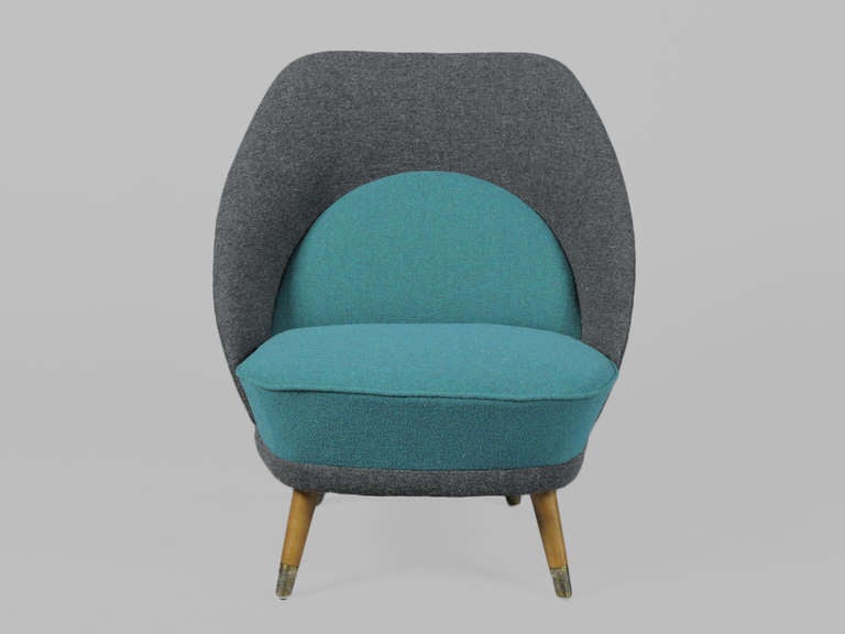 Vintage 1950s Scandinavian Occasional Chair

Petite Atomic Era 2-Toned Lounge Chair with splayed beech legs and brass feet.  Womb-like design.  Newly upholstered in gray and blue boucle fabric. Ready for pick up, delivery, or shipping.