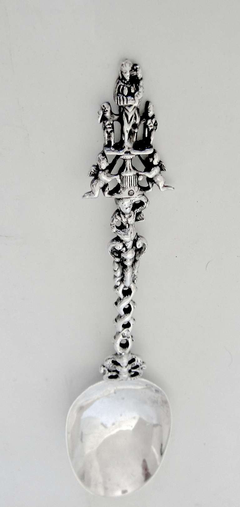 This rare large size Sterling Silver Apostle  spoon is the thirteenth spoon from a set of the twelve Apostles plus one. The thirteenth spoon was the figure of another of the Saints and in this case a figure of the Virgin Mary. This is hallmarked and