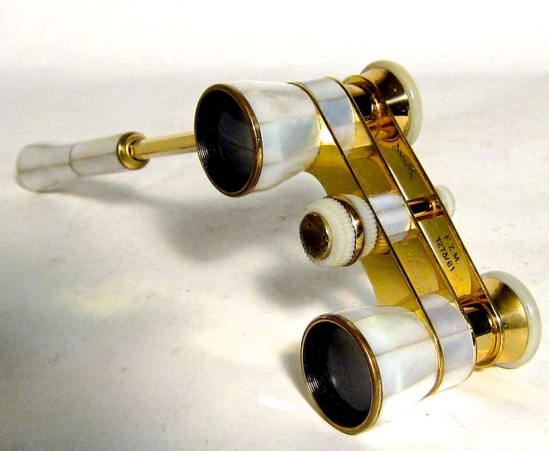 Brass and Mother of Pearl/ BOSCH Multinett opera glasses , circa 1949 are in better than good condition, mostly lightly used or near new condition.Folding and extendable handle. Marked 