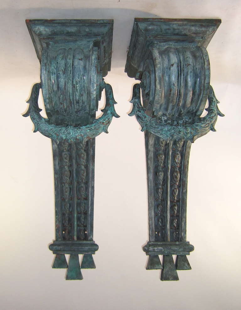 This extraordinary pair of oxidized copper corbels from the Nicholas Senn Block building in Milwaukee, Wisconsin which was built in 1886 has withstood the test of time. The details are well preserved and intact as is the structure.Nicholas Senn was