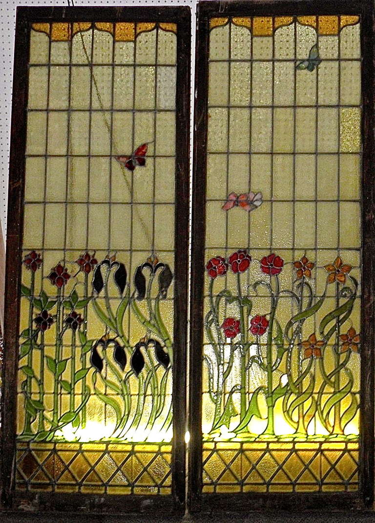 The two panels are in their original wood frames from the early 20th century. A fine example of the Art Nouveau period. Each panel measures 77