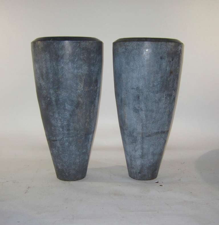 Unknown A Pair of Industrial Urns